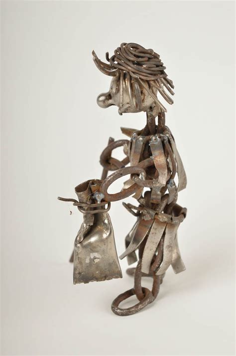 metal box with ivory and metal figurine sitting on top|Amazon.com: Metal Sculpture Home Decor.